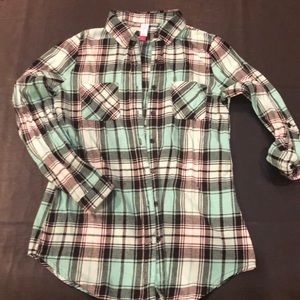 Teal and black plaid shirt.